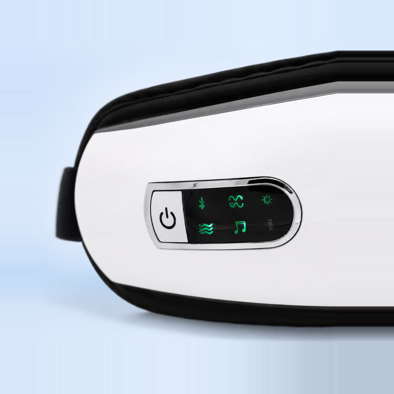 Close-up of the control panel on the side of the shell: power button and lit mode icons